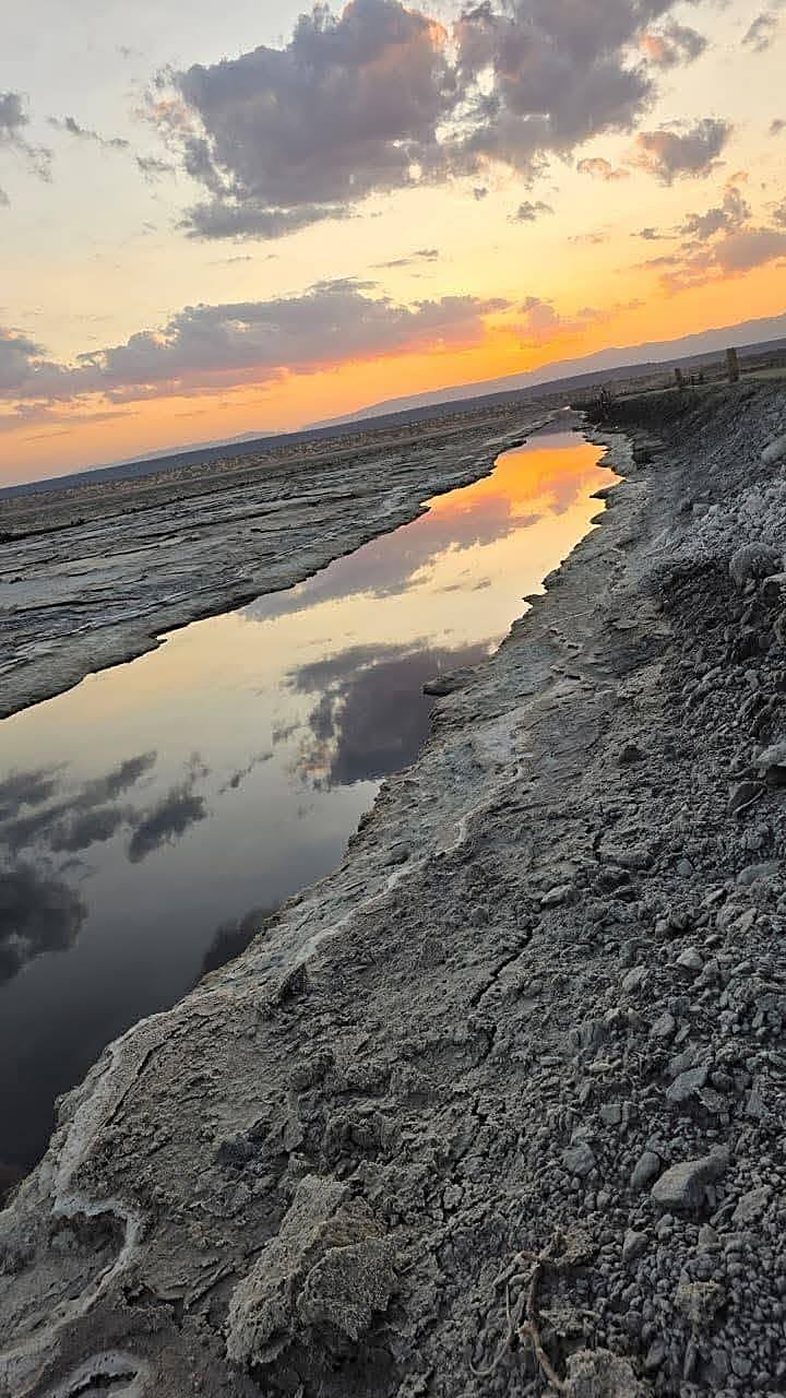 Sunset reflected in the salt flats near Lake Magadi